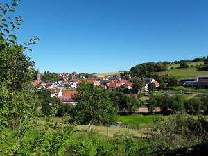 a view of a town with houses and trees at Ferienwohnung Monika Scholtz in Königheim