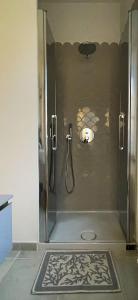 a shower with a glass door in a bathroom at CASAMALFITANA I DOGI in Maiori +31 photos
