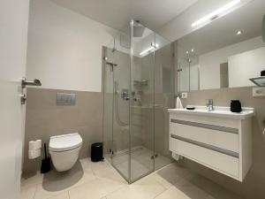 Koupelna v ubytování Quartier Schneespecht Westendpalais + 39 fotografií