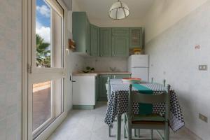 A cozinha ou cozinha compacta de Villa Marina by BarbarHouse
