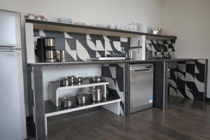 Kuchyň nebo kuchyňský kout v ubytování Villa Arianna - Suite Arianna
