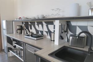 Kuchyň nebo kuchyňský kout v ubytování Villa Arianna - Suite Arianna