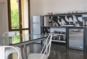 Kuchyň nebo kuchyňský kout v ubytování Villa Arianna - Suite Arianna