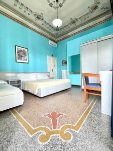 Ένα ή περισσότερα κρεβάτια σε δωμάτιο στο Hotel Doria