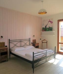 Postel nebo postele na pokoji v ubytování Villa Arianna - Suite Arianna