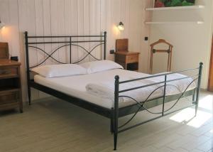 Postel nebo postele na pokoji v ubytování Villa Arianna - Suite Arianna