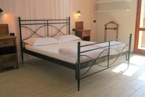 Postel nebo postele na pokoji v ubytování Villa Arianna - Suite Arianna