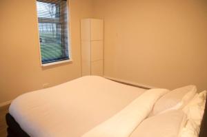Cama ou camas em um quarto em Landzicht 05