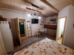 Katil atau katil-katil dalam bilik di Apartmány pri kostole