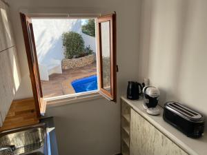Kuchyňa alebo kuchynka v ubytovaní Villa con piscina privada y gran jardín