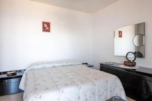 Posteľ alebo postele v izbe v ubytovaní Villa Miramare