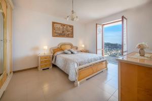 Posteľ alebo postele v izbe v ubytovaní Villa Miramare
