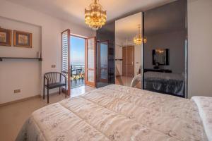 Posteľ alebo postele v izbe v ubytovaní Villa Miramare