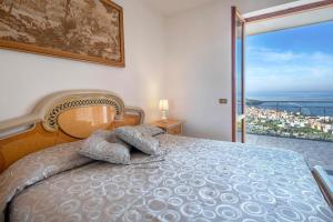 Posteľ alebo postele v izbe v ubytovaní Villa Miramare