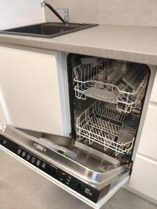 Kuchyň nebo kuchyňský kout v ubytování Apartamenty Aleje Jerozolimskie