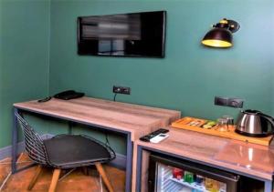 Телевизор и/или развлекательный центр в Sunset Hotel Marmaris
