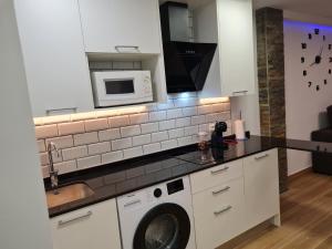 Kuchyň nebo kuchyňský kout v ubytování Hany apartment Ducado 2-I