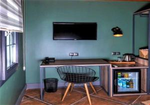 Телевизор и/или развлекательный центр в Sunset Hotel Marmaris