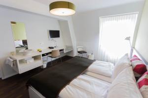 Letto o letti in una camera di Design Hotel Plattenhof