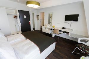 TV o dispositivi per l'intrattenimento presso Design Hotel Plattenhof