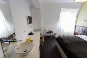 Letto o letti in una camera di Design Hotel Plattenhof