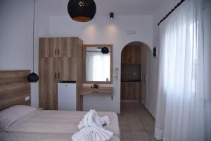 A bed or beds in a room at Katerina View