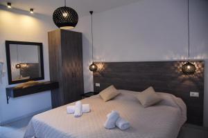 A bed or beds in a room at Katerina View