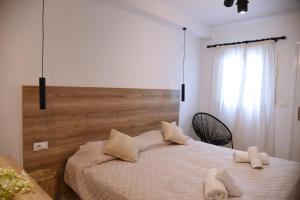 A bed or beds in a room at Katerina View