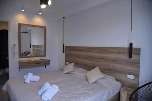 A bed or beds in a room at Katerina View