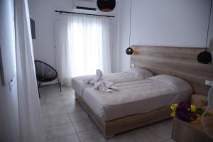 A bed or beds in a room at Katerina View