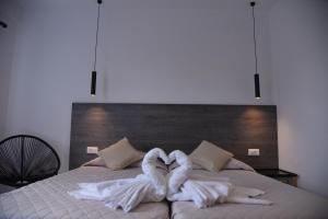 A bed or beds in a room at Katerina View