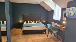 Ένα ή περισσότερα κρεβάτια σε δωμάτιο στο Le Beaugency