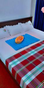 Cama o camas de una habitación en mirissa niraj guest