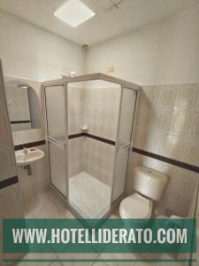 Koupelna v ubytování Hotel PARAMO LIDERATO