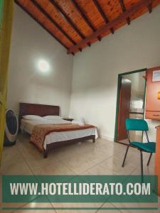 Postel nebo postele na pokoji v ubytování Hotel PARAMO LIDERATO