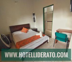 Postel nebo postele na pokoji v ubytování Hotel PARAMO LIDERATO