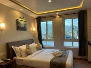 Voodi või voodid majutusasutuse Hotel Kesu Home toas