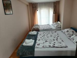 Voodi või voodid majutusasutuse Apartman Solomonovic toas