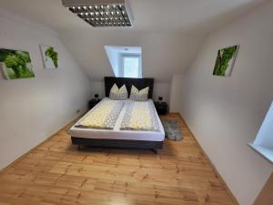 a bedroom with a bed in a attic at Haus Mika in Cochem