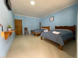 Posteľ alebo postele v izbe v ubytovaní El Valle Resort & Spa - Aguas Termales