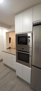 A kitchen or kitchenette at Duque de Galatino CENTRO de Granada