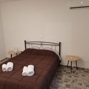 Postel nebo postele na pokoji v ubytování Melissa Houses