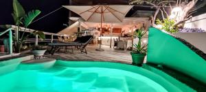 a view of a patio with a table and an umbrella at b&b da Laura in Ponza