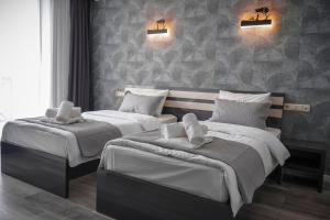 Ένα ή περισσότερα κρεβάτια σε δωμάτιο στο Besami Hotel