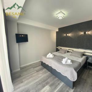 Ένα ή περισσότερα κρεβάτια σε δωμάτιο στο Besami Hotel
