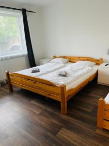Postel nebo postele na pokoji v ubytování Apartmány Lednice Nejdek
