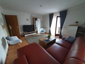 TV a/nebo společenská místnost v ubytování Apartment Morgensonne