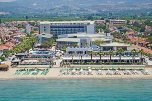 an aerial view of a resort on the beach at Palm Wings Kusadasi Beach Resort&Spa in Davutlar