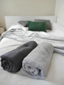 מיטה או מיטות בחדר ב-City Art Inn