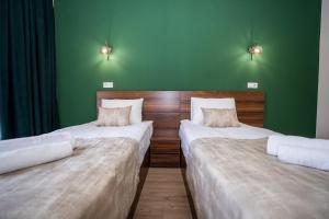 Katil atau katil-katil dalam bilik di Eltisy Guest House
